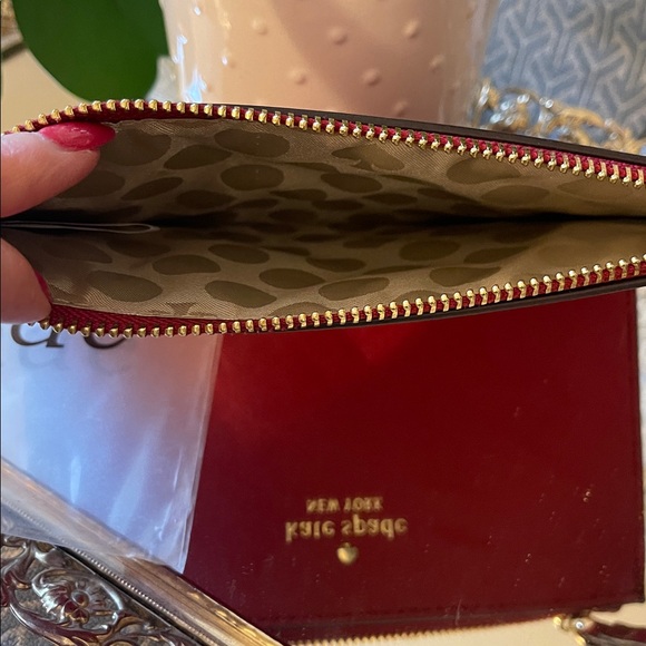 Brand new Kate Spade wristlet in wine - Picture 2 of 3